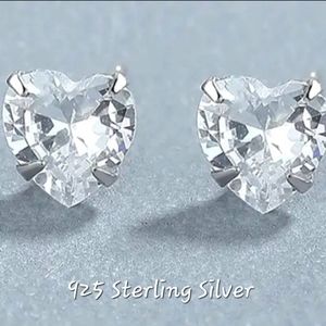 925 Sterling Silver zircon heart studs. NWT. Fast Ship. Top Seller